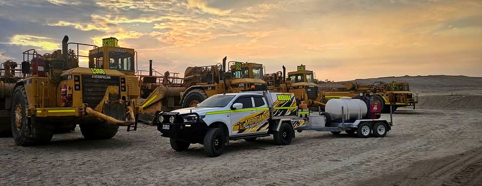 The Morgan's Heavy Diesel service ute and trailer on a worksite